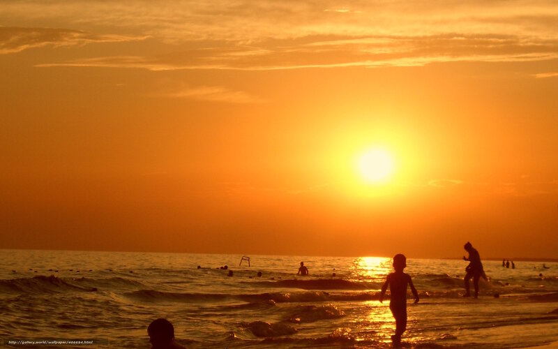Silhouetted Children at Beach