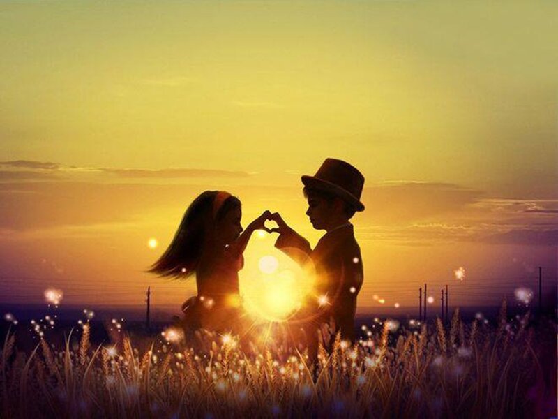 Silhouetted Children in Field