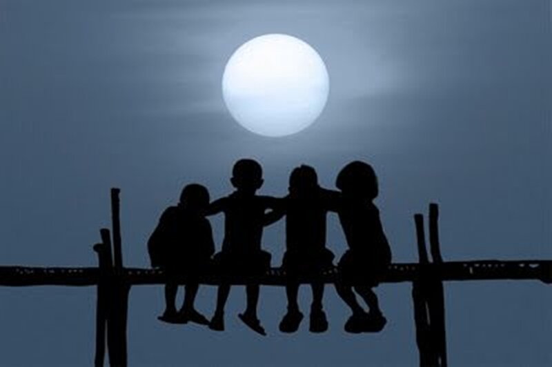 Silhouetted Children on Bridge