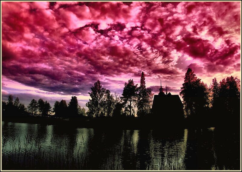 Silhouetted Church by Lake