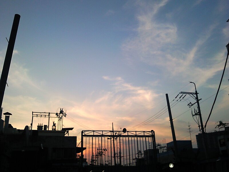 silhouetted cityscape at dusk