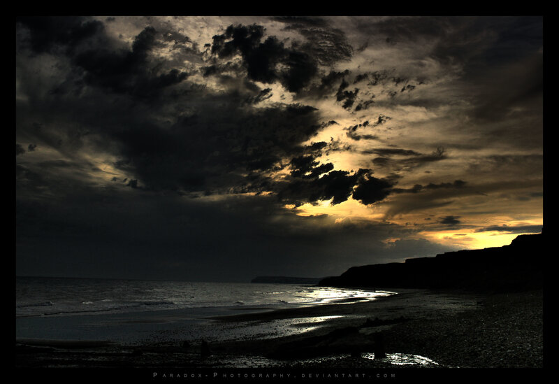 Silhouetted Cliffs at Beach