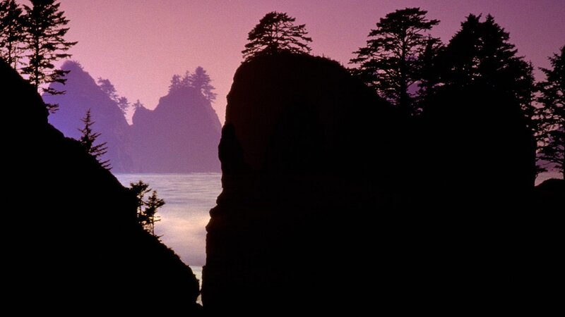 silhouetted cliffs at dusk