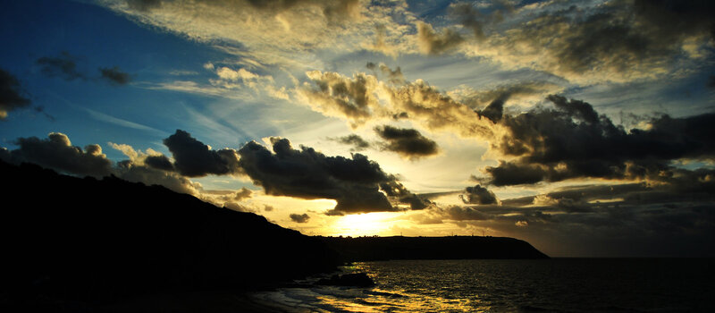 Silhouetted Cliffs at Sunset
