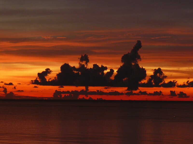 Silhouetted Clouds over Ocean