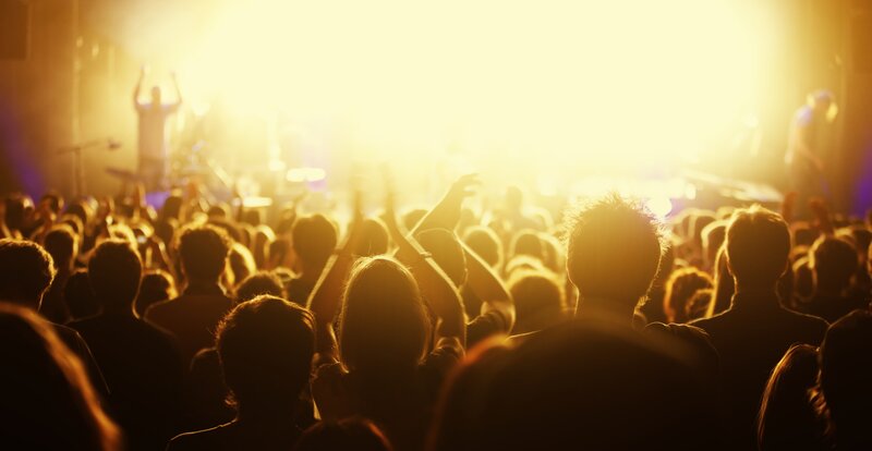 Silhouetted Concert Crowd — Yellow