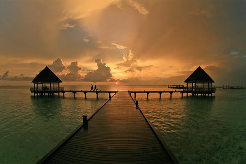 Silhouetted Couple on Pier — Orange, Serene