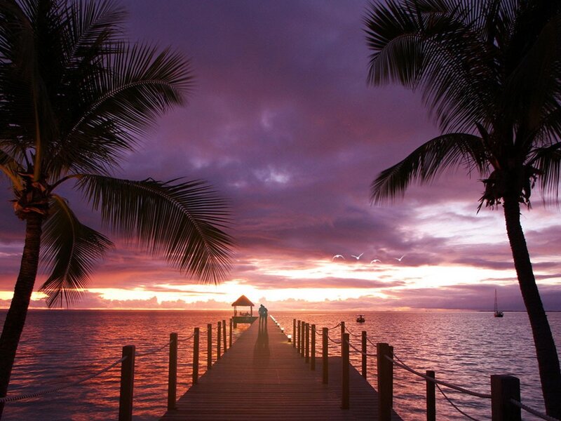 Silhouetted Couple on Pier — Purple