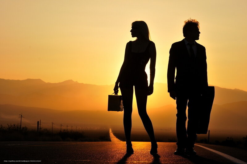 Silhouetted Couple on Road — Orange