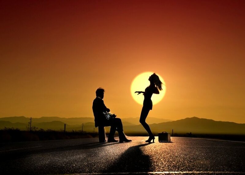 Silhouetted Couple on Road