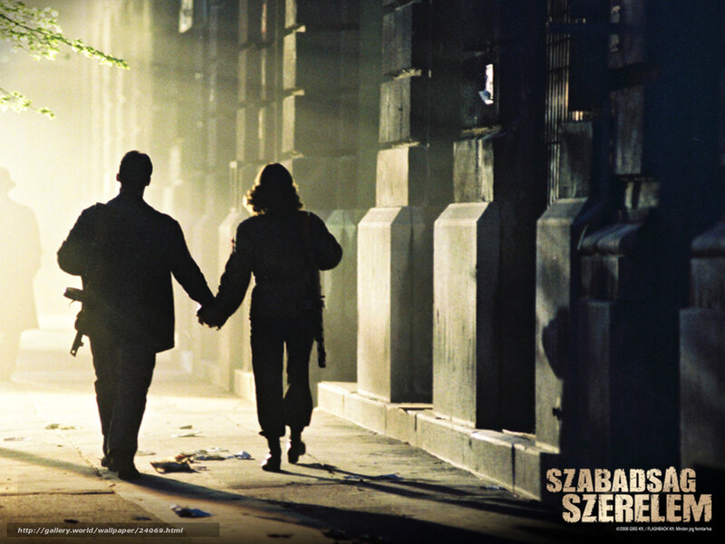 Silhouetted couple walking