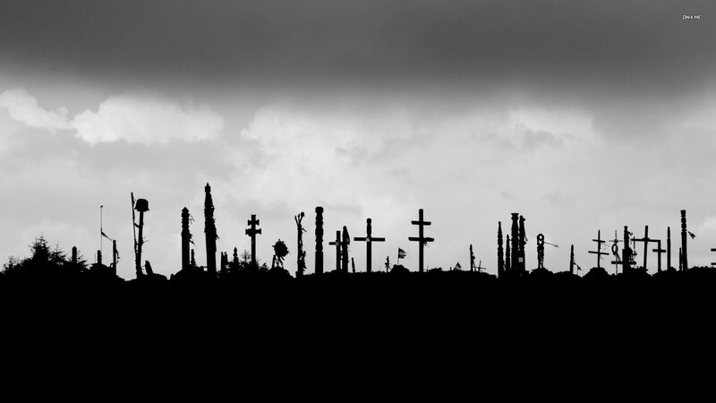 Silhouetted Crosses on Hill