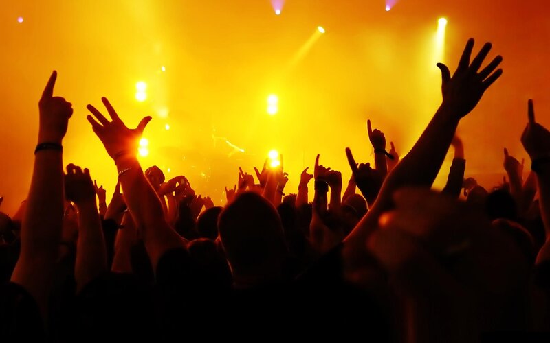 Silhouetted Crowd at Concert — Yellow, Energetic, Night, Photograph, Hands, Stage Lights