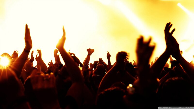 Silhouetted Crowd at Concert — Yellow