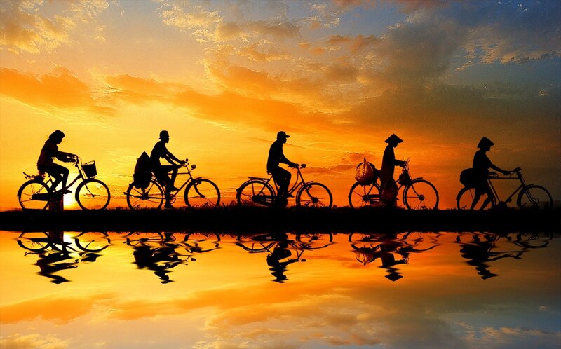Silhouetted Cyclists