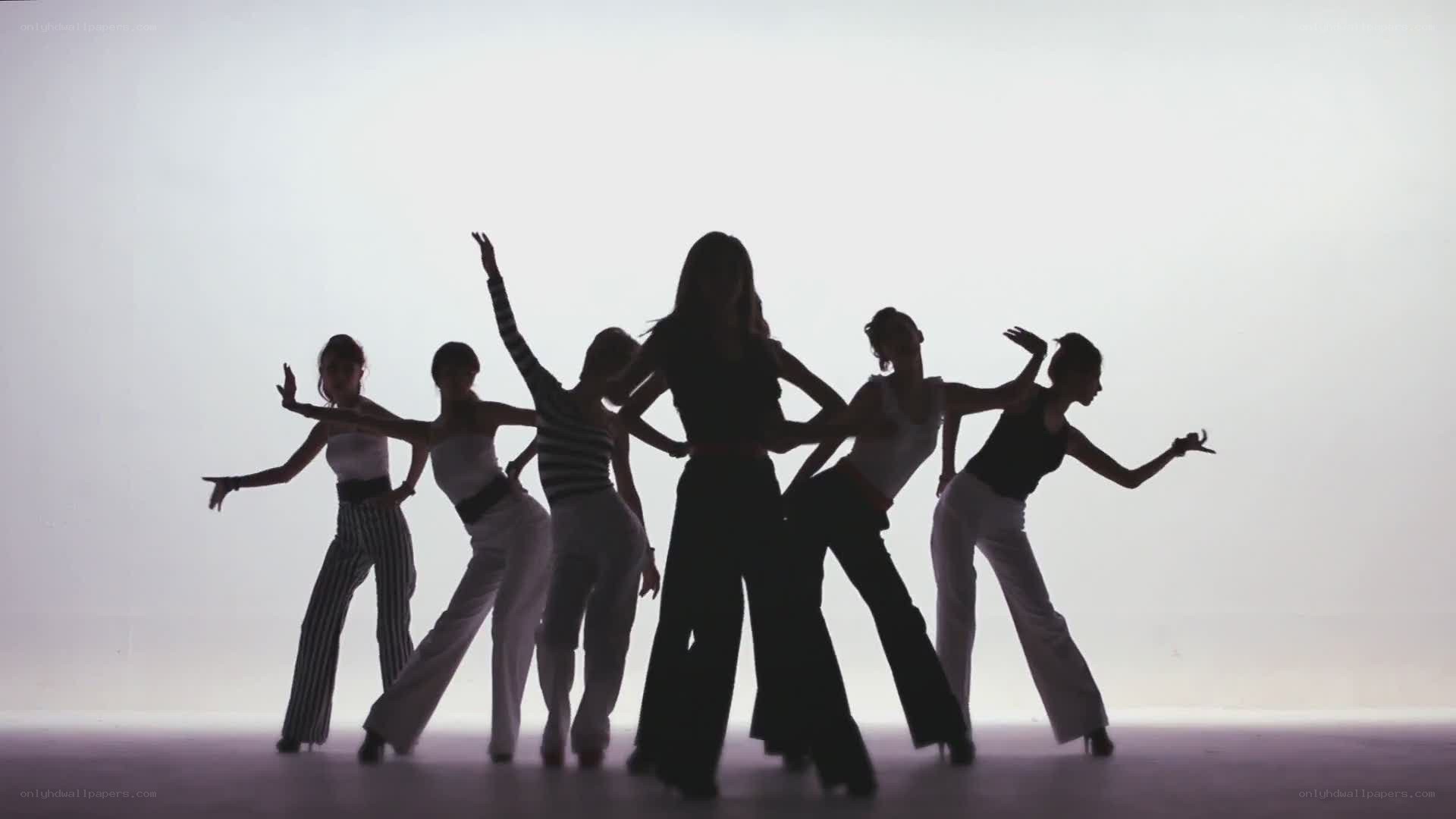 silhouetted dancers in motion