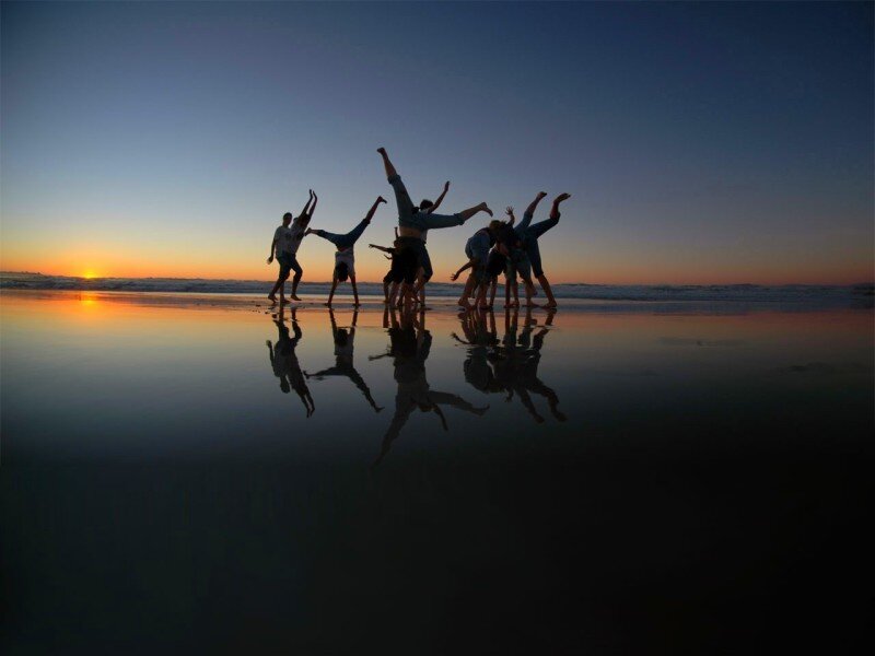 Silhouetted Dancers on Beach — Blue