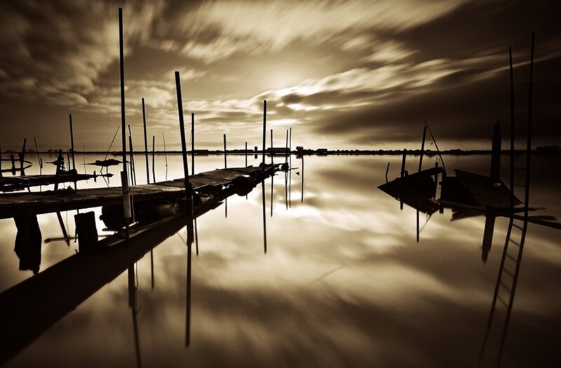 Silhouetted Docks at Sunset