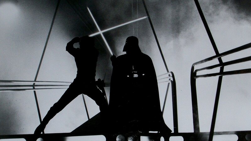 Silhouetted Duel on Platform