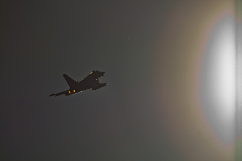 Silhouetted Fighter Jet