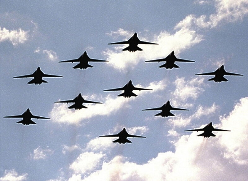 Silhouetted Fighter Jets — Blue