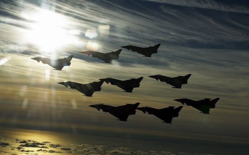 Silhouetted Fighter Jets — Yellow