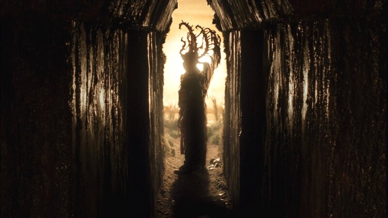 Silhouetted Figure in Tunnel