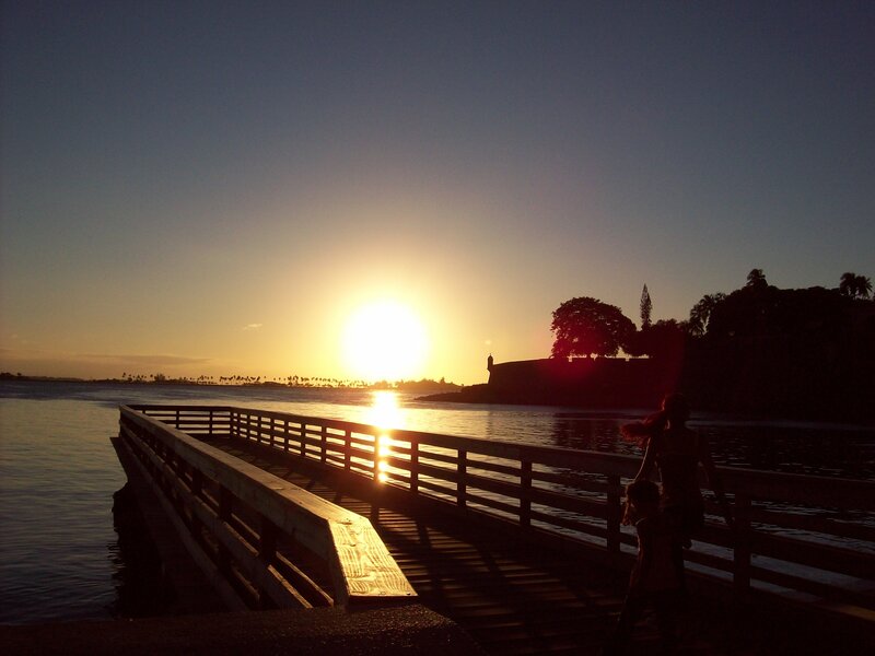 Silhouetted Figures on Pier — Blue, Serene