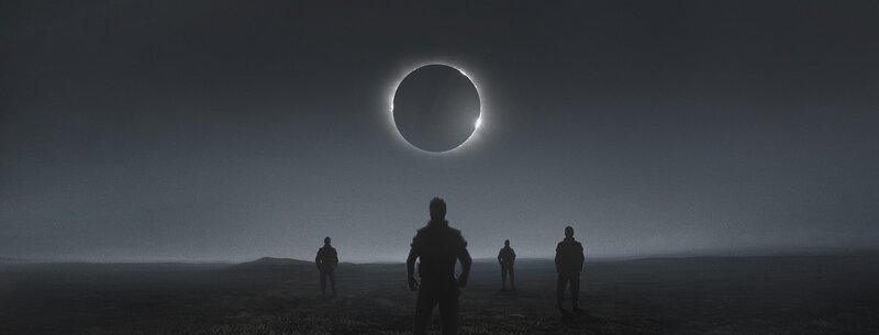 Silhouetted Figures under Eclipse