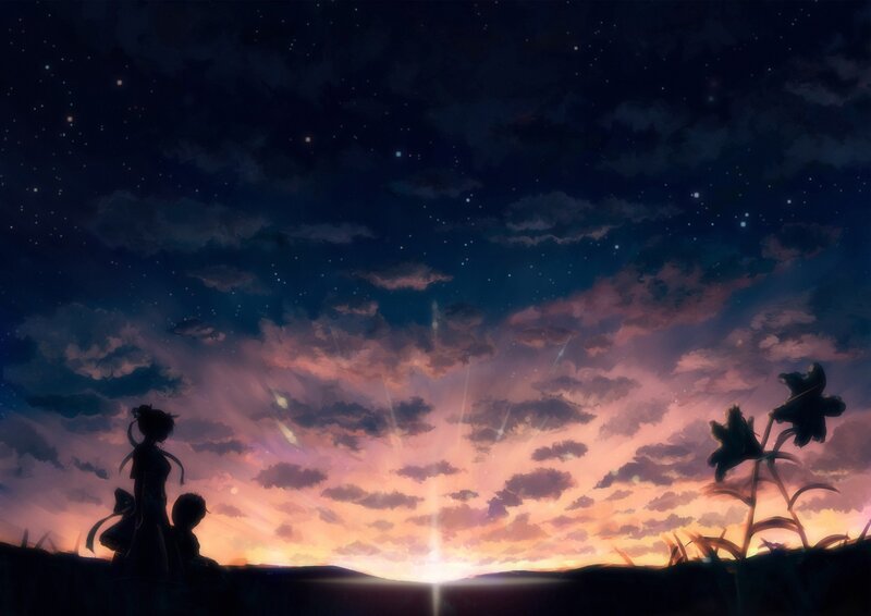 Silhouetted Figures Watching Sunset