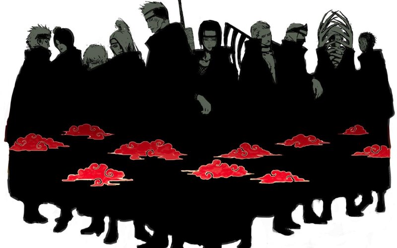 Silhouetted Figures with Red Clouds