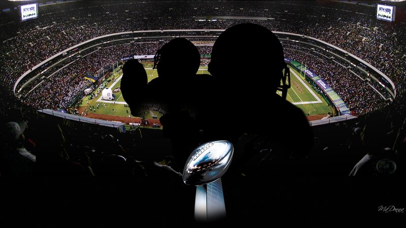Silhouetted Football Players