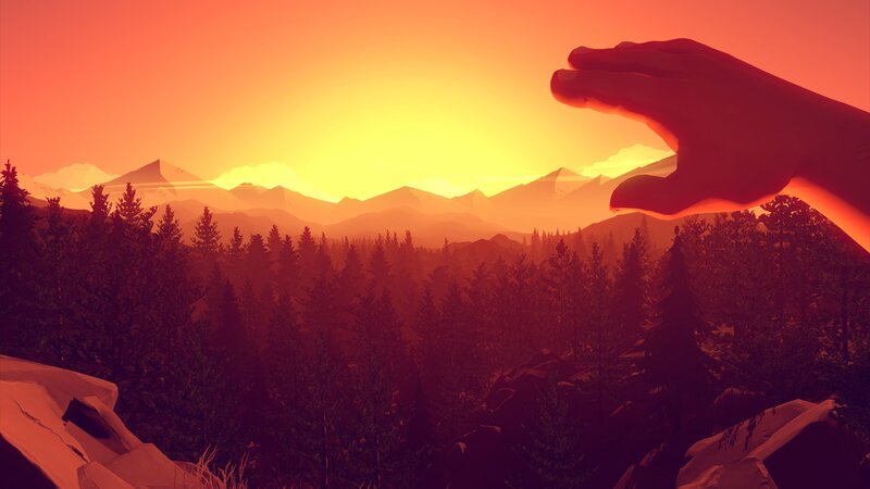 Silhouetted Hand over Forest