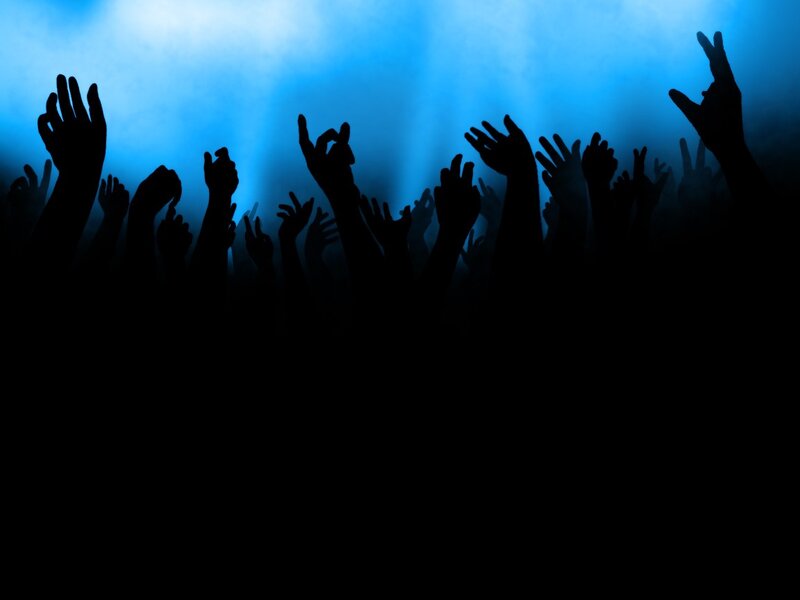 Silhouetted Hands at Concert — Blue, Energetic