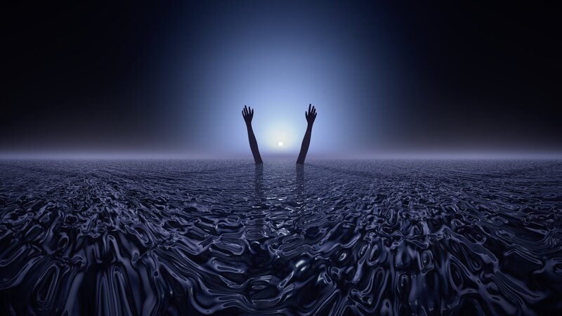Silhouetted Hands in Water
