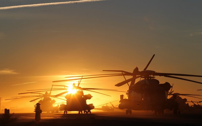 Silhouetted Helicopters — Orange