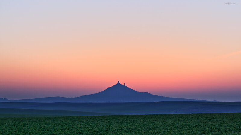 Silhouetted Hill at Dusk — Orange