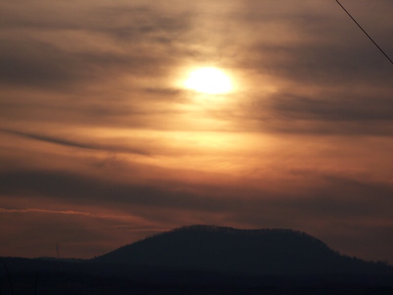 Silhouetted Hill at Sunset — Orange