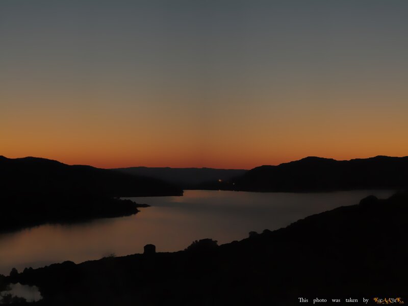 Silhouetted Hills at Dusk — Orange, Serene, Sunset