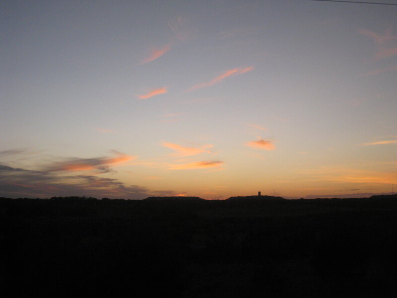 Silhouetted Hills at Dusk — Orange