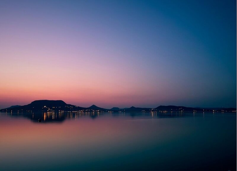 Silhouetted Hills at Dusk — Pink