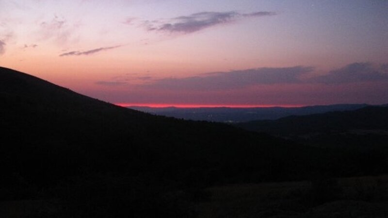 Silhouetted Hills at Dusk — Purple