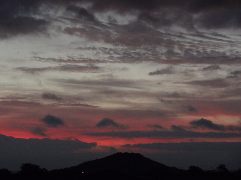 Silhouetted Hills at Dusk — Red