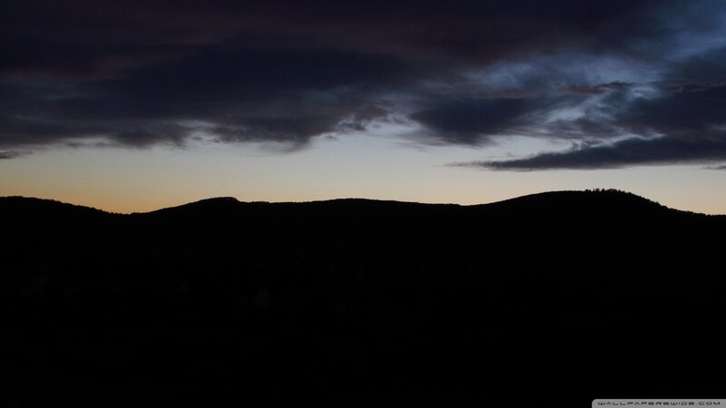 Silhouetted hills at dusk