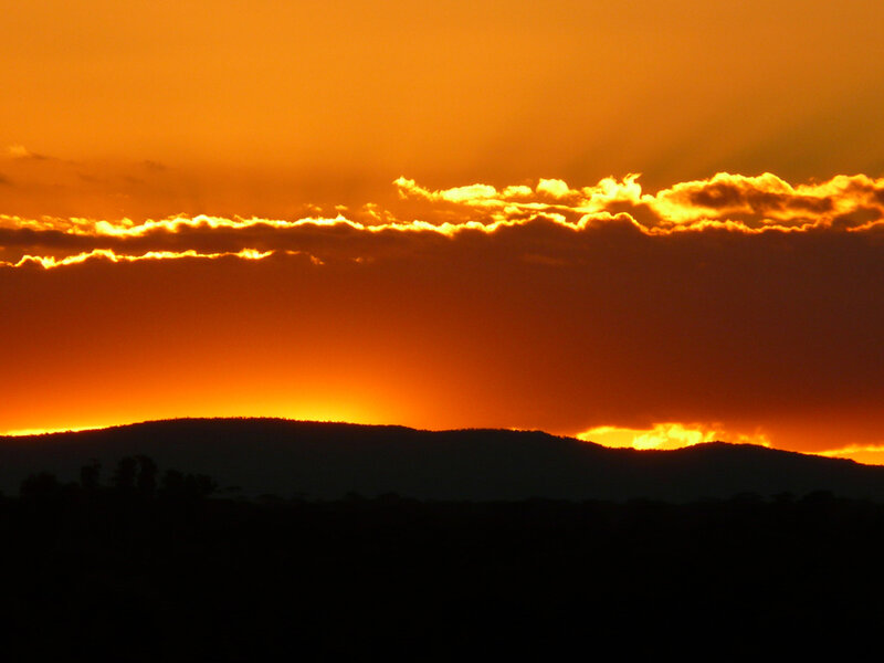Silhouetted Hills at Sunset — Orange, Dramatic, Photograph, Mountains