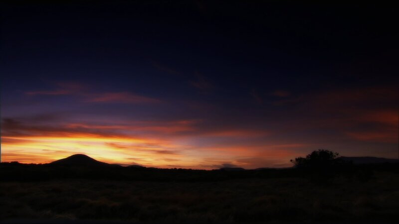 Silhouetted Hills at Sunset — Orange, Dramatic, Photograph, Sky, Clouds