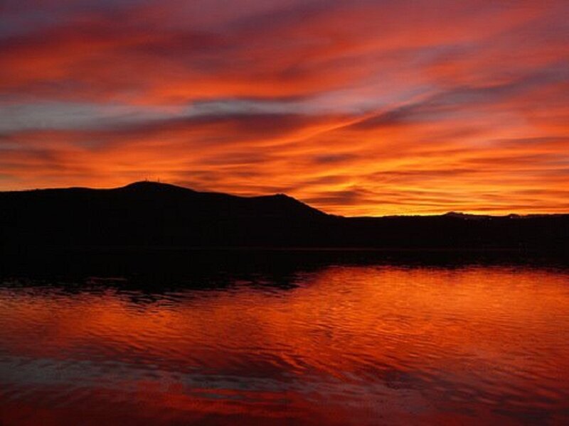 Silhouetted Hills at Sunset — Orange, Dramatic, Photograph, Sky