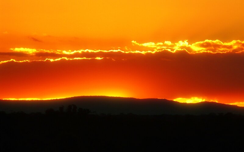 Silhouetted Hills at Sunset — Orange
