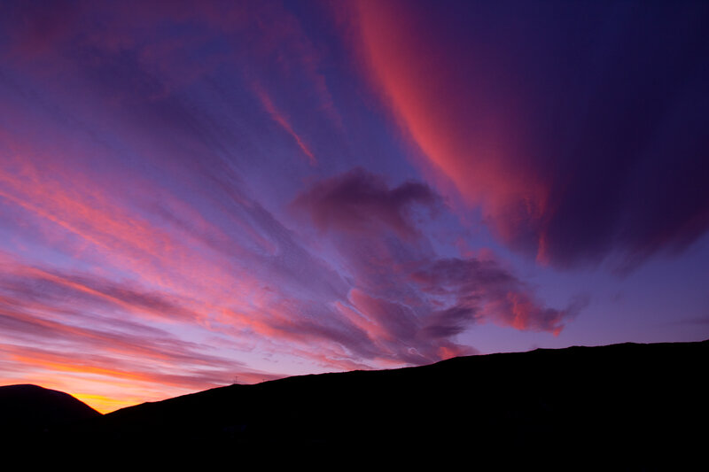 Silhouetted Hills at Sunset — Purple, Dramatic