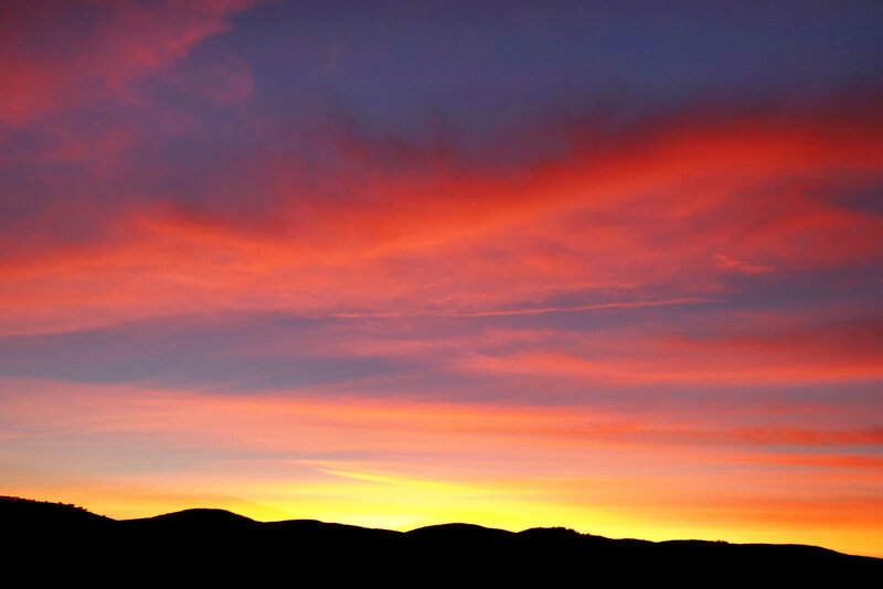 Silhouetted Hills at Sunset — Red